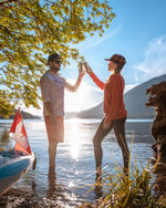 Couple enjoying their sparkling Maple 3 water by a lake in British Columbia